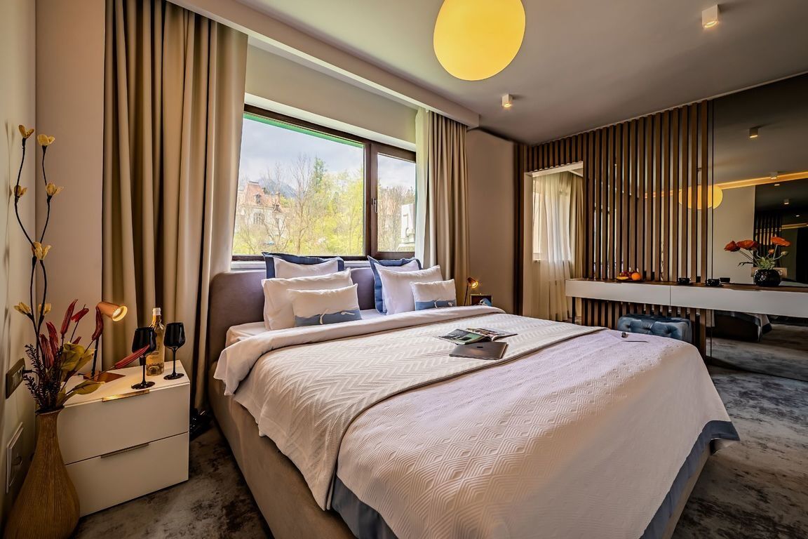 Top 5 cazări la munte din România pentru o vacanță perfectă cazare munte romania camera hotel sinaia